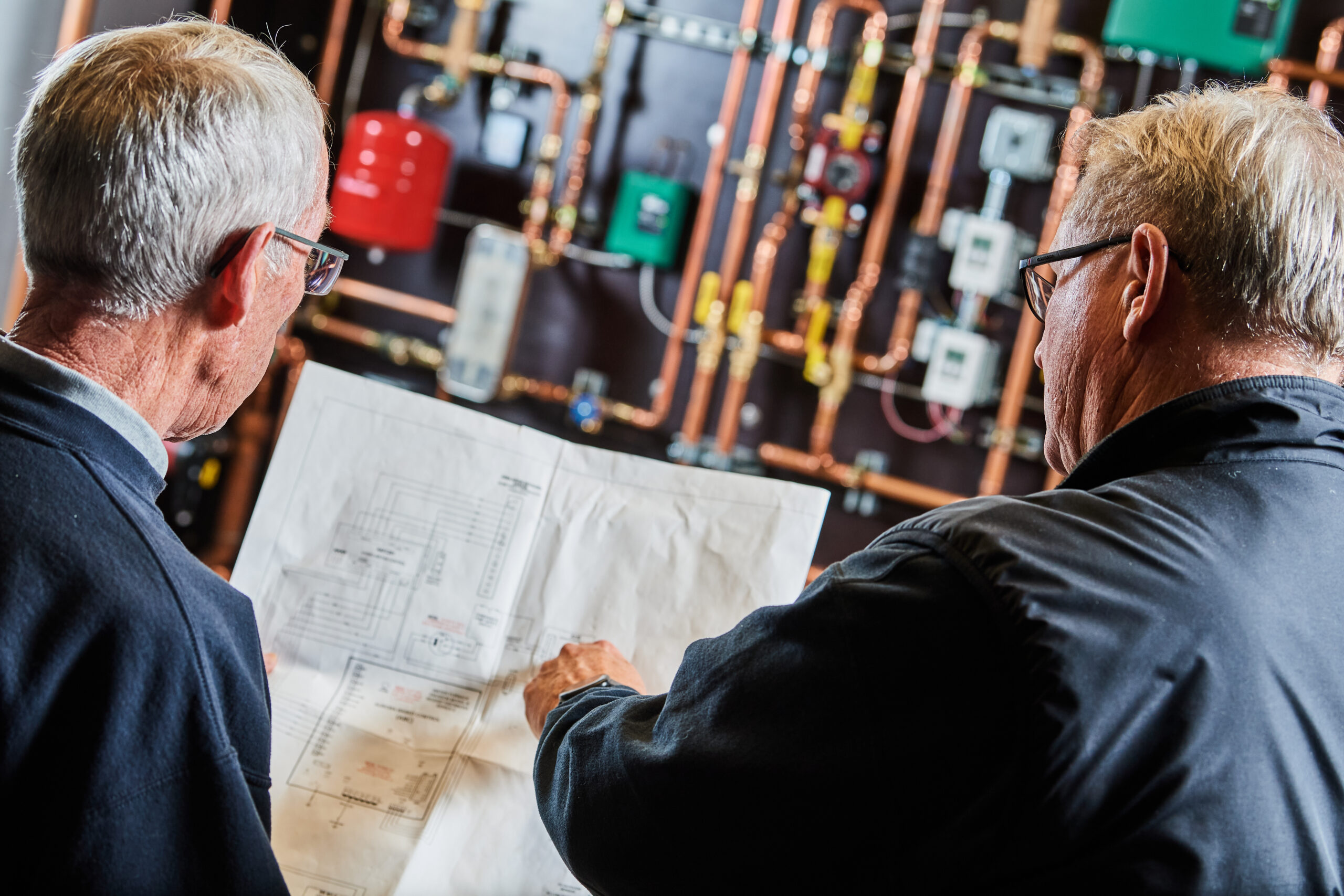 image of a BVHVAC technician working on system - Geothermal