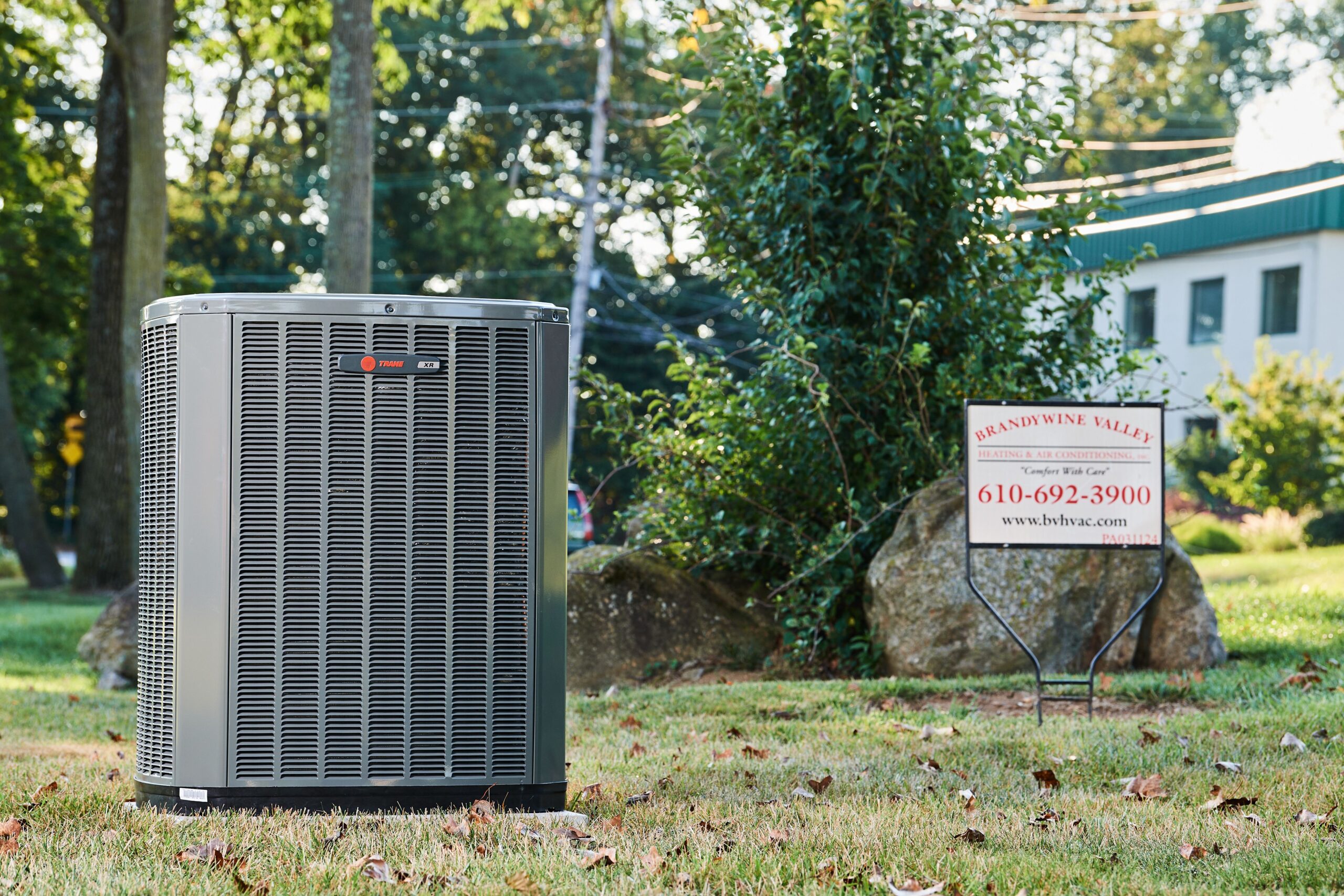 Trane and logo Home air conditioning and repair image of a system